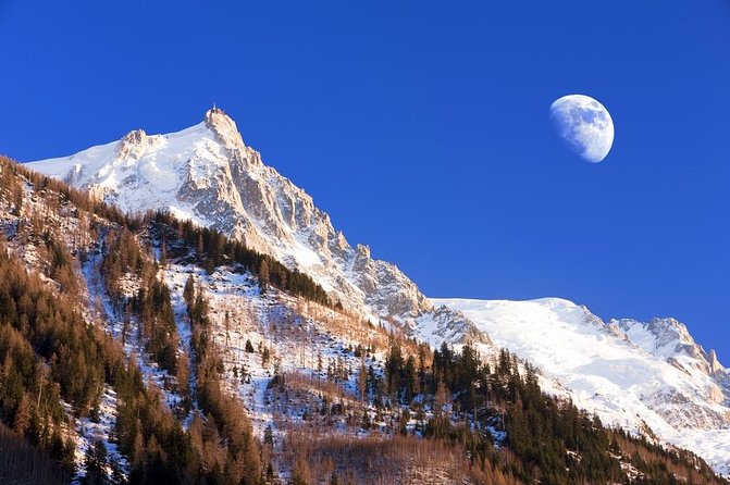 Chamonix & Mont Blanc Panoramic Sky-Glass Bus Guided Day Trip - Arriving in Chamonix beneath Mont Blanc
