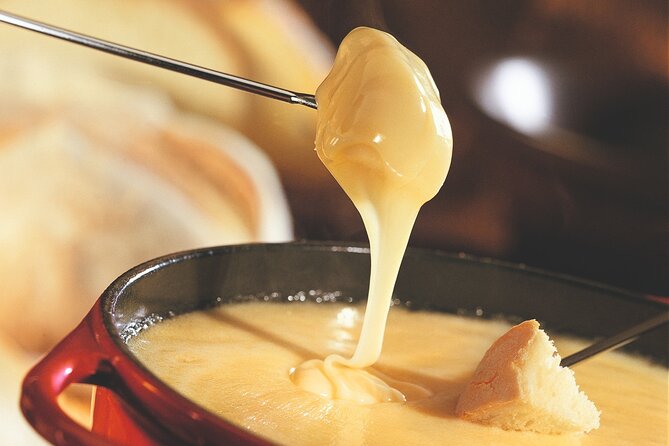 Culinary Tour from Zurich with Traditional Swiss Cheese Fondue Dinner - Riding the 800-meter cable car to Felsenegg