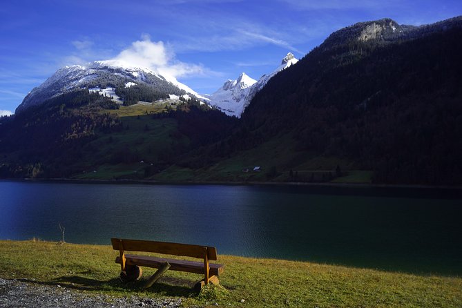 From Zurich: Breathtaking waterfall and lakes private tour - A green-blue mountain lake above Glarus