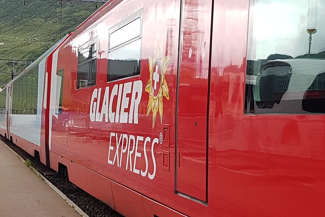 Glacier Express Panoramic Train Round Trip in one Day Private Tour from Basel - Lunch arrives while the mountains roll past