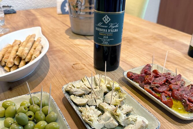 Homemade Italian Lasagna Experience with a Local Family - Starting with olives, artichokes, and Mediterranean flavors