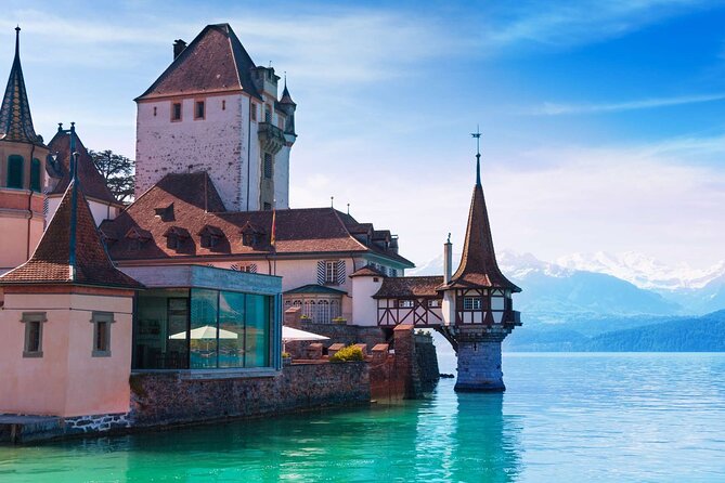 Interlaken: Private Car Tour to Swiss Villages, Capital & Castles - Spiez, where the lake meets a hilltop castle