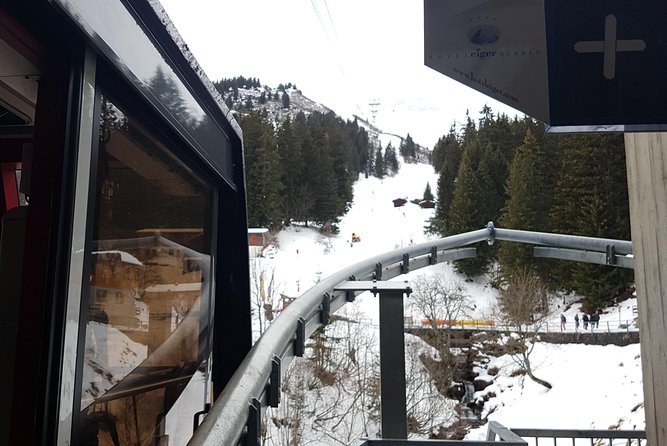 Mt. Schilthorn & Mürren Small Group Day Trip from Interlaken - Riding the Stechelberg cableway toward Schilthorn