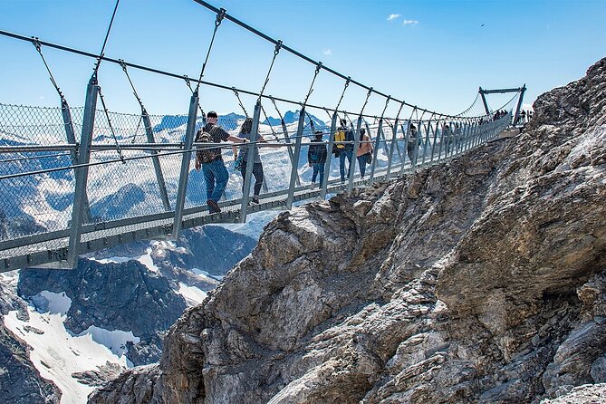 Mt. Titlis Glacier & Lucerne Old Town Tour | From Lucerne - Riding toward the summit of Mt. Titlis