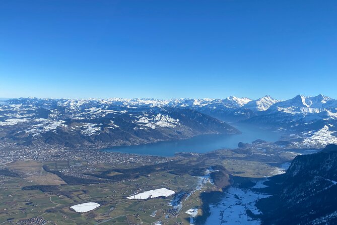 Private helicopter flight to Stockhorn mountain, with view to the Swiss Alps - Thun, its castle, and the Bernese Alps