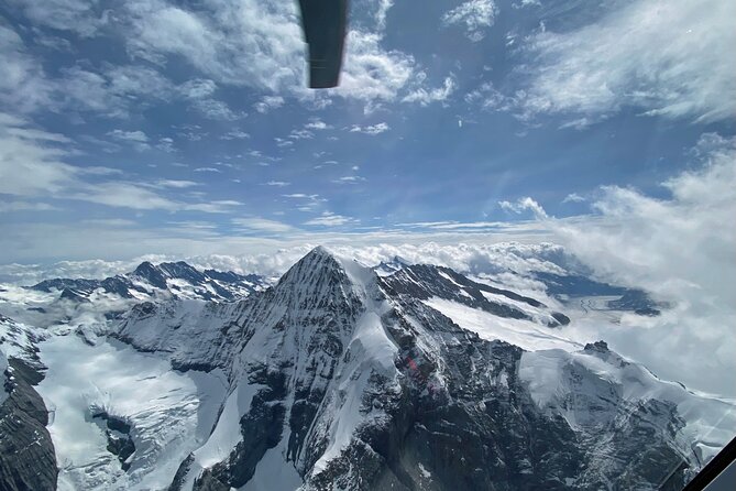 Private helicopter tour to the Swiss Alps - see the Eiger, Monch and Jungfrau - Flying toward the Bernese Oberland
