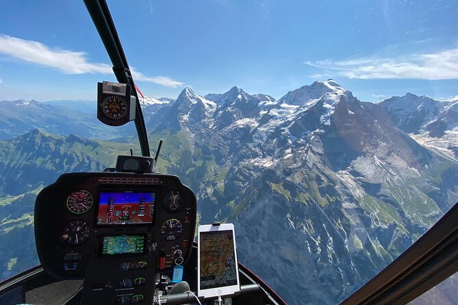 Private Swiss Alps helicopter tour over snow covered mountain peaks and glaciers - Interlaken between two striking lakes