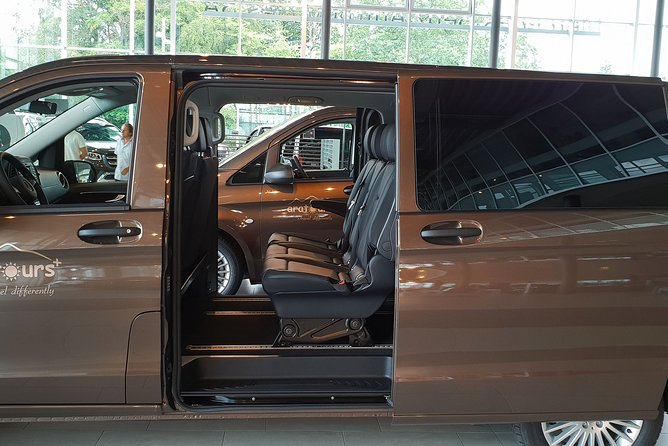 Private Transfer from Grindelwald to Zurich Airport - Child seats, water, and practical comfort