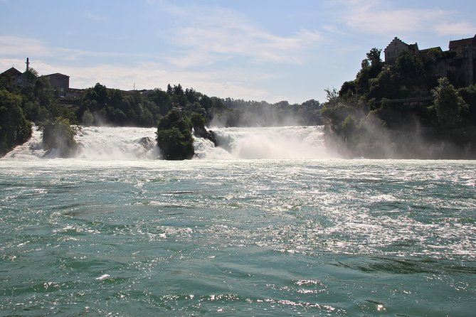 Rhine Falls Coach Tour incl. entry tickets from Zurich - The optional boat ride near the cascades