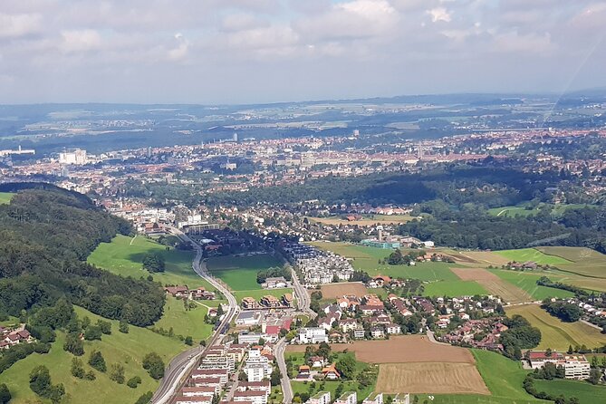 Swiss Capital city helicopter sightseeing tour - the ideal flight to see Berne - Parliament’s dome anchors the city