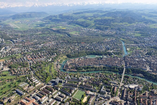 Swiss Capital city helicopter sightseeing tour - the ideal flight to see Berne - Wankdorf stadium and the big YB sign