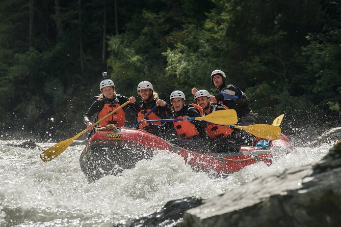 Whitewater Action Rafting Experience in Engadin - Calm water, paddle practice, and the swim stop