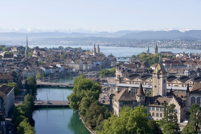 Zurich City Tour with Audio Commentary - Old Town churches and guild houses from the road
