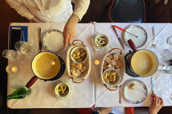 Zurich Food Tour with 10 Local Delicacies, Cheeses & Chocolates - Grossmünster and the Food Story of Religion