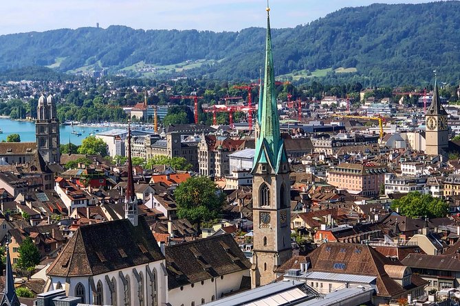 Zurich Highlights In A 2+ Hour Walking Tour Including Panoramic Views - St Peter’s Church and the Old Town streets